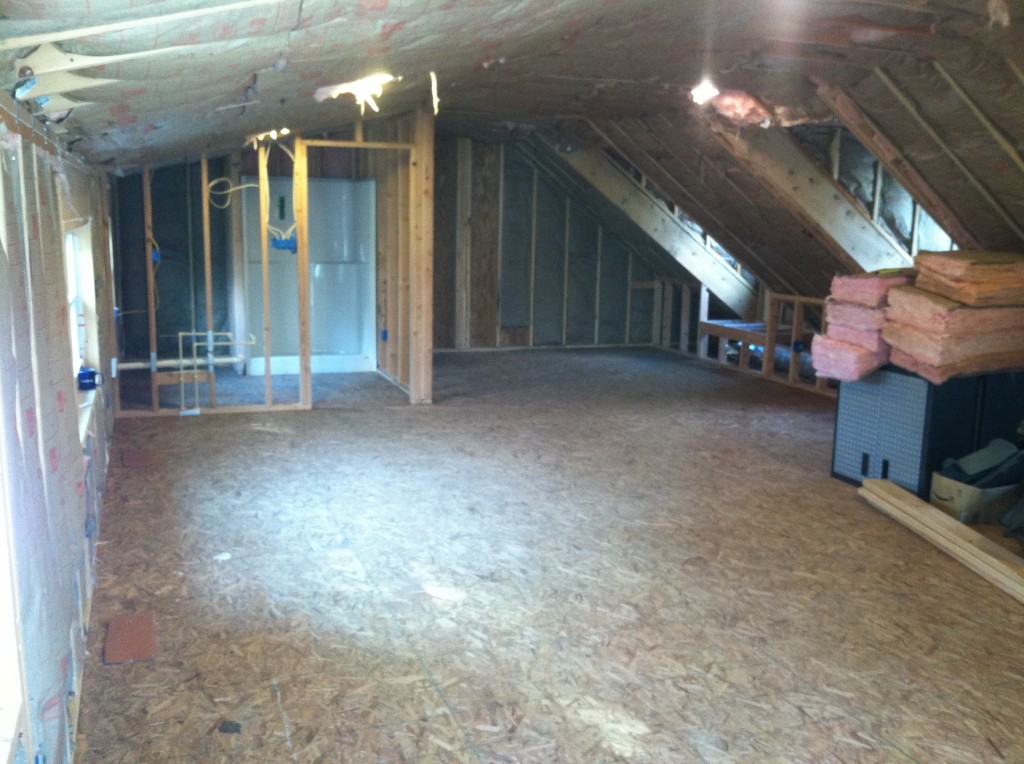 A few days or weeks later, and things are all framed out and the HVAC is installed. No more sweltering and/or stuffy Summer days in the old shop - we now will have humidity-free comfort year-round! By the time this picture was taken, we had figured out that we needed to pretty much empty the upstairs, and it's all downstairs - which is INSANE - just crammed full so that you can't walk at all...